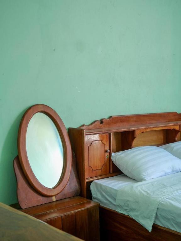 Kfg Guesthouse Thakhek Oda fotoğraf